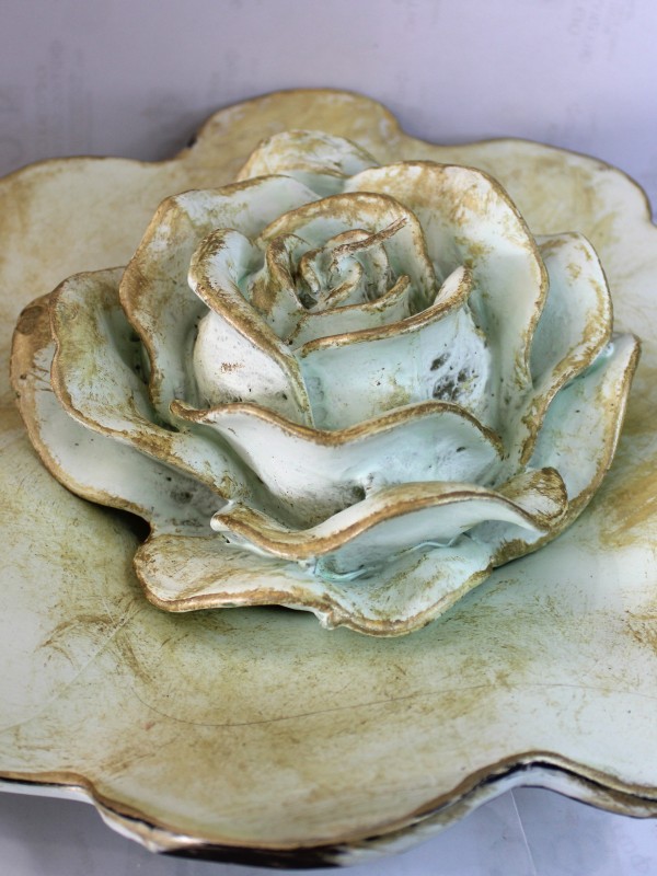 Blue rose on a plate